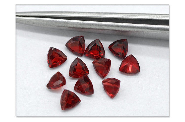 Natural garnet faceted  triangle shaped-Price to be negotiate